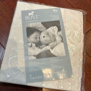 Brand new white cotton sheets for baby crib